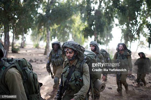 Israeli soldiers during a military exercise on September 1, 2013 near the border with Syria, in the Israeli-annexed Golan Heights. Tension's are...