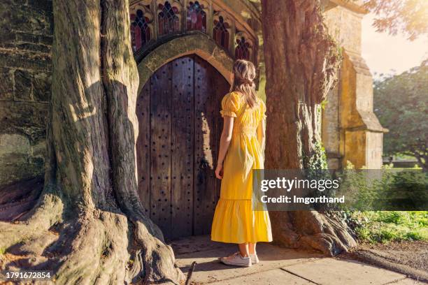 teenage girl sightseeing beautiful village of stow-on-the-wold - stow on the wold stock pictures, royalty-free photos & images