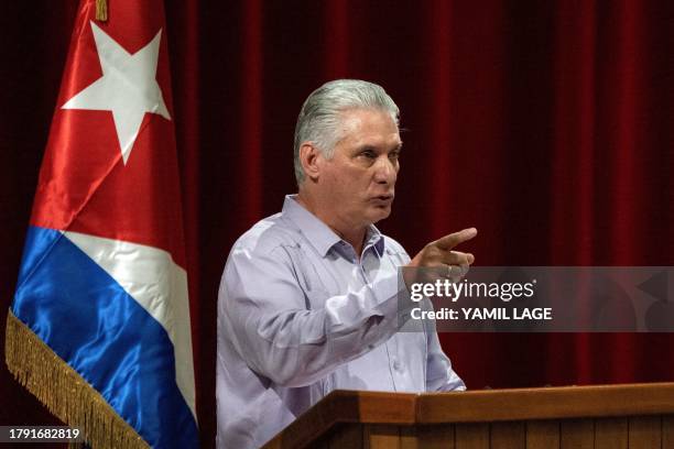 Cuban President Miguel Díaz Canel delivers a speech during the closing of the IV Conference "Nation and Emigration" at the Convention Palace in...