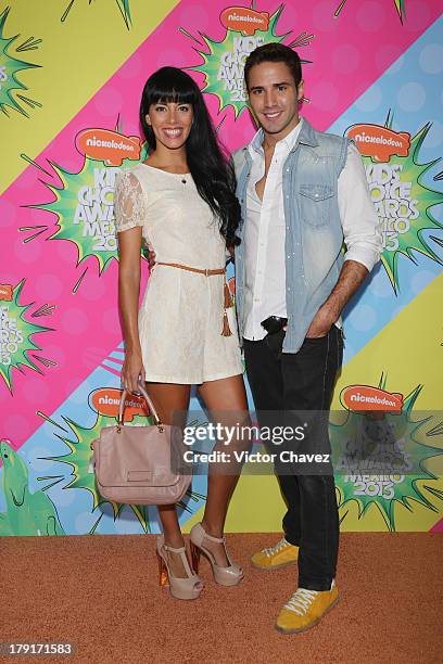 Ahyrin Ollarves and Roman Camara arrive at Kids Choice Awards Mexico 2013 at Pepsi Center WTC on August 31, 2013 in Mexico City, Mexico.