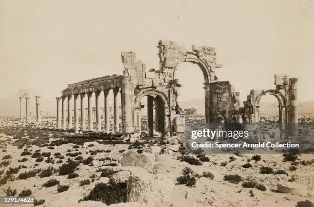 The triumphal arch in the ancient city of Palmyra in Syria, circa 1880.