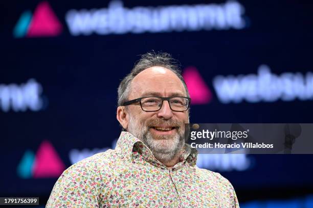 Founder of Wikipedia Jimmy Wales smiles while talking onstage about Artificial Intelligence during Web Summit opening night on November 13, 2023 in...