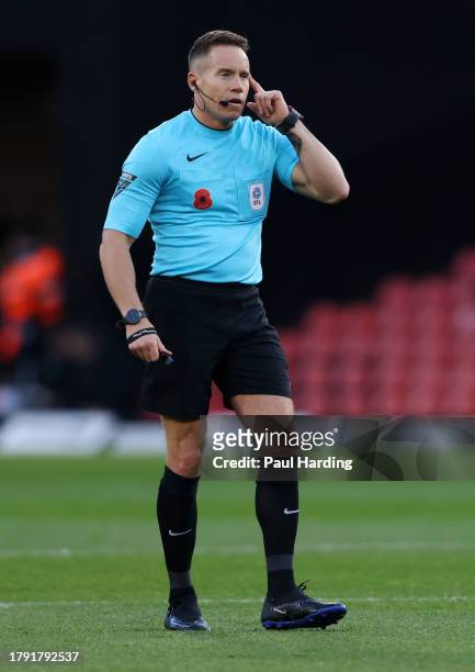 Referee Stephen Martin reacts during the Sky Bet Championship match between Watford and Rotherham United at Vicarage Road on November 11, 2023 in...