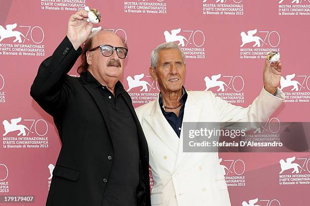 Composer Pino Donaggio and actor Enzo Staiola attend "Non Eravamo Solo... Ladri di Biciclette. Il Neorealismo" Premiere during the 70th Venice...
