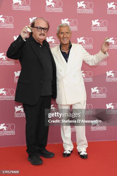 Composer Pino Donaggio and actor Enzo Staiola attend "Non Eravamo Solo... Ladri di Biciclette. Il Neorealismo" Premiere during the 70th Venice...