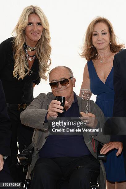 Actress Tiziana Rocca, Director Bernardo Bertolucci and Rosetta Sannelli pose with Kinéo 2013 award at Premio Kineo Photocall during the 70th Venice...