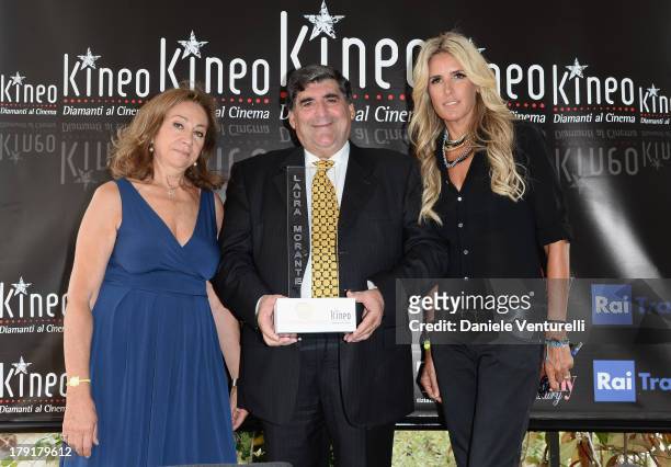 Rosetta Sannelli, Mayor of Taormina Eligio Giardina and actress Tiziana Rocca attend Premio Kineo Photocall during the 70th Venice International Film...