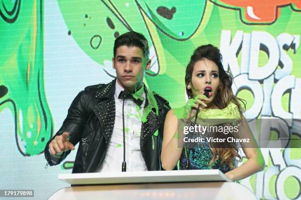 Danna Paola speaks onstage after getting slimed during the Kids Choice Awards Mexico 2013 at Pepsi Center WTC on August 31, 2013 in Mexico City,...