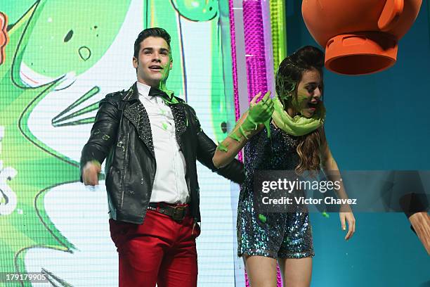 Danna Paola speaks onstage after getting slimed during the Kids Choice Awards Mexico 2013 at Pepsi Center WTC on August 31, 2013 in Mexico City,...