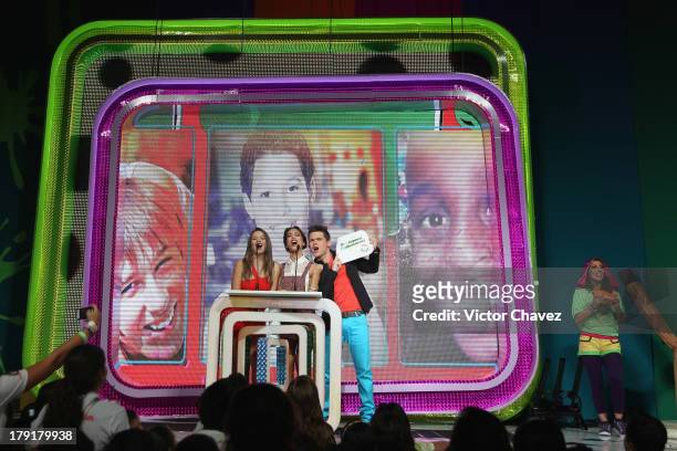 Ana Carolina Grajales, Willy Martin and Sol Rodriguez speak onstage during the Kids Choice Awards Mexico 2013 at Pepsi Center WTC on August 31, 2013...