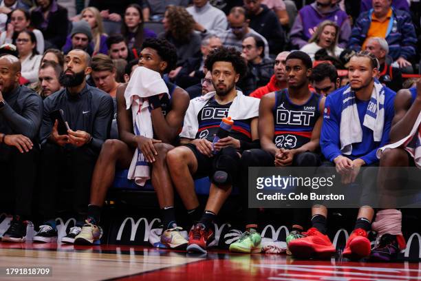 Cade Cunningham of the Detroit Pistons sits on the bench alongside Jaden Ivey during the second half of the game against the Toronto Raptors at...