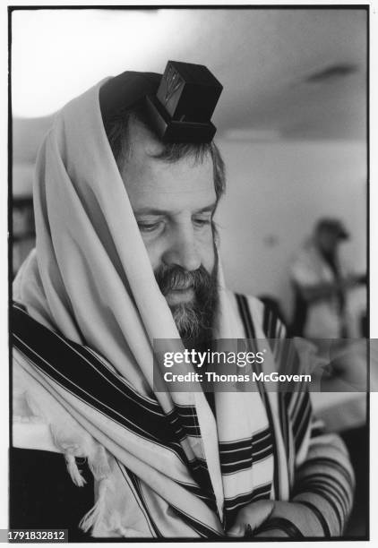 Rabbi Harlig of Chabad of the Inland Empire wearing tefillin and a prayer shawl in Ontario in California in 2012.