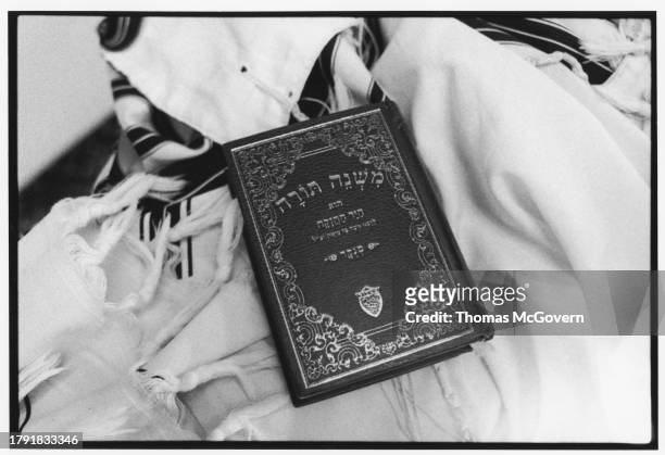 Jewish prayer book laying on a prayer shawl before a Yom Kippur service at Chabad of the Inland Empire in Ontario in California in 2012.