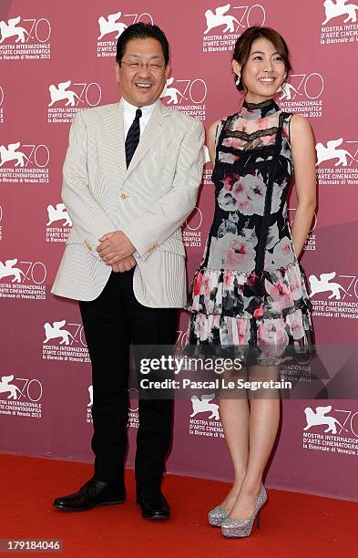 The president of the Studio Ghibli Koji Hoshino and actress Miori Takimoto attend 'The Wind Rises' Photocall during the 70th Venice International...