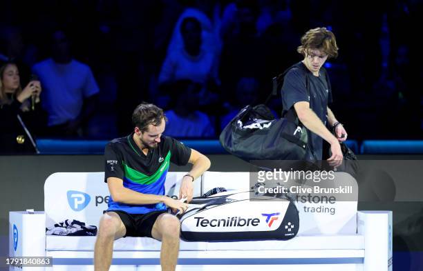 Andrey Rublev walks past opponent Daniil Medvedev after defeat in the Men's Singles Round Robin match on day two of the Nitto ATP Finals at Pala...