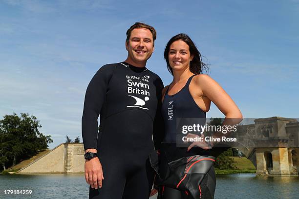 David Walliams and Keri-Anne Payne pose for pictures during the British Gas SwimBritain event at Blenheim Palace on September 1, 2013 in Woodstock,...