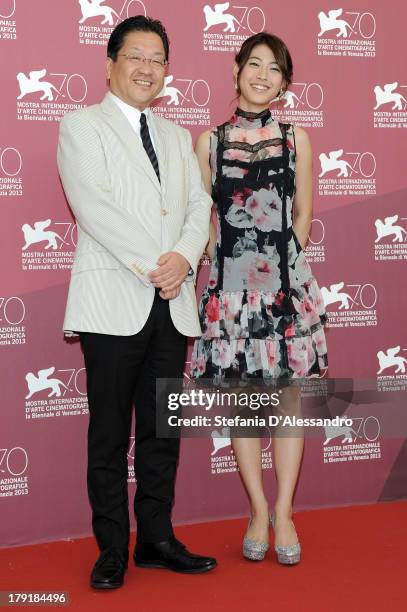 The president of the Studio Ghibli Koji Hoshino and the actress and singer Miori Takimoto attend "Kaze Tachinu" Photocall during the 70th Venice...