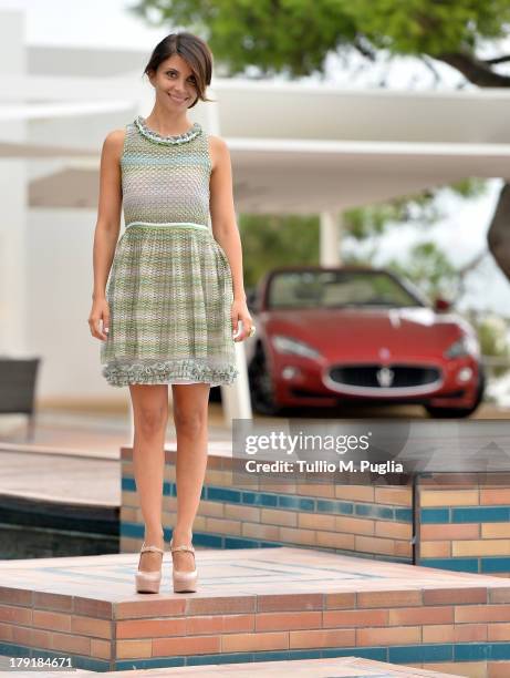 Actress Claudia Potenza pose for photographers during the 70th Venice International Film Festival at Terrazza Maserati on August 31, 2013 in Venice,...