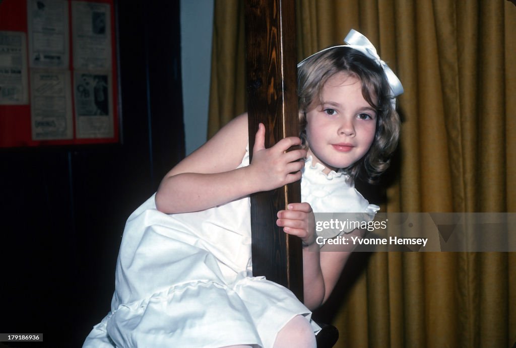 'ET' Star Drew Barrymore Poses For A Photograph