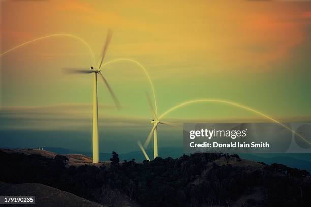 windmills - wind turbine long exposure stock-fotos und bilder