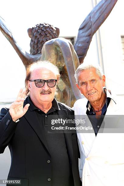 Actor Enzo Staiola and music composer Pino Donaggio attend 'Non Eravamo solo... Ladri di Biciclette - Il Neorealismo' premiere during the 70th Venice...