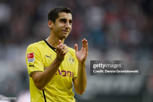 Henrikh Mkhitaryan of Borussia Dortmund celebrates after the Bundesliga match between Eintracht Frankfurt and Borussia Dortmund at Commerzbank Arena...