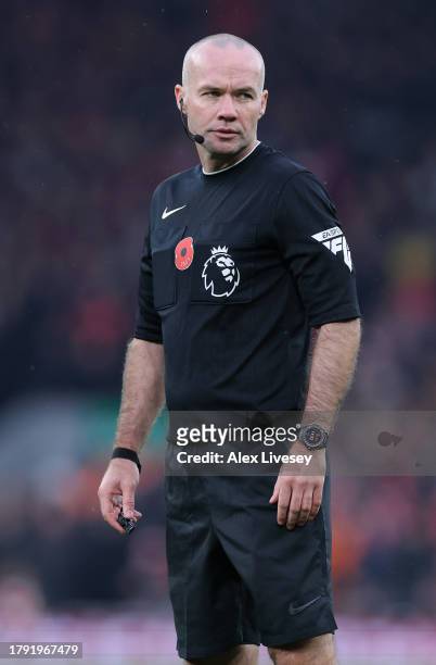 Referee Paul Tierney during the Premier League match between Liverpool FC and Brentford FC at Anfield on November 12, 2023 in Liverpool, England.