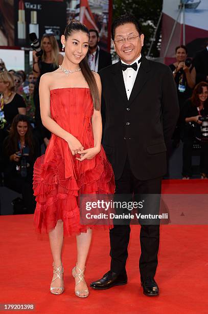 The president of the Studio Ghibli, Koji Hoshino and actress Miori Takimoto attend "Kaze Tachinu" Premiere during the 70th Venice International Film...