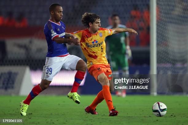 Dejan Jakovic of Shimizu S-Pulse controls the ball against Ademilson of Yokohama F.Marinos during the J.League J1 second stage match between Yokohama...