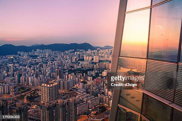city skyline at sunset, view from skyscraper - skyscraper stock pictures, royalty-free photos & images