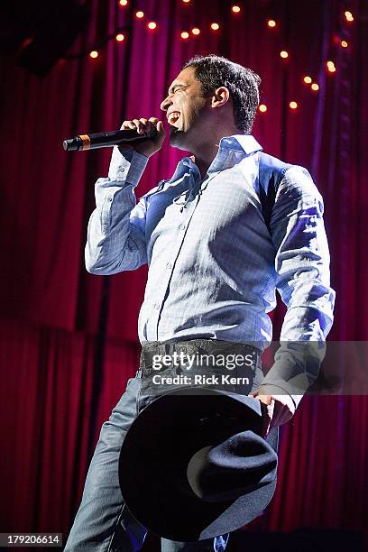 Vocalist Bobby Pulido performs in concert as part of Festival People en Español Presented by Target at The Alamodome on August 31, 2013 in San...