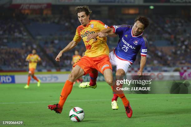 Dajan Jakovic of Shimizu S-Pulse controls the ball against Jungo Fujimoto of Yokohama F.Marinos during the J.League J1 second stage match between...