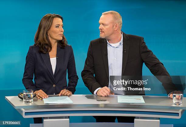 The Moderators Anne Will and Stefan Raab poses for a photograph, before the TV Debate with German Chancellor and Christian Democrat Angela Merkel and...