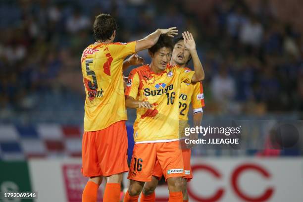 Dejan Jakovic, Mitsunari Musaka and Takuma Edamura of Shimizu S-Pulse celebrate the team's 2-1 victory in the J.League J1 second stage match between...