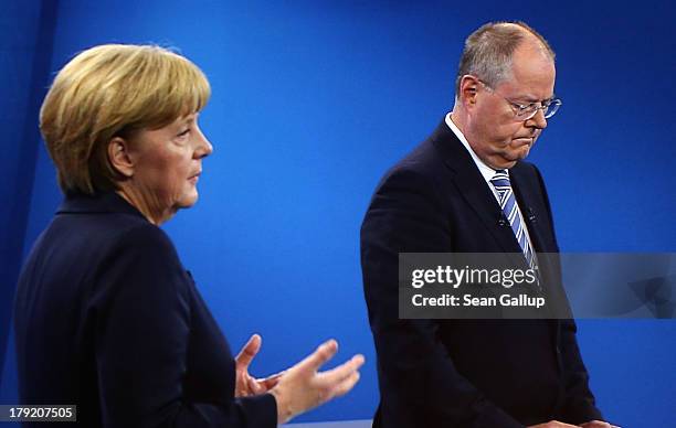 In this screenshot taken from German television German Chancellor and Christian Democrat Angela Merkel and Social Democrats chancellor candidate Peer...