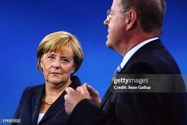 In this screenshot taken from German television German Chancellor and Christian Democrat Angela Merkel and Social Democrats chancellor candidate Peer...