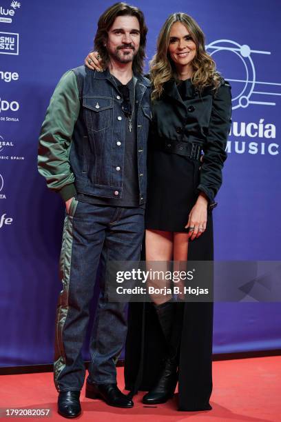 Juan Esteban Aristizabal aka Juanes and Karen Martinez attend to Santalucia Universal Music Week : "El Flamenco Es Universal" photocall on November...