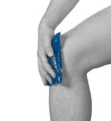 Cool gel pack on a swollen hurting knee.