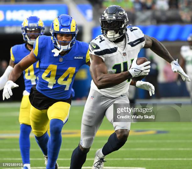 Inglewood, CA Los Angeles Rams' Ahkello Witherspoon chases Seattle Seahawks' DK Metcalf during game action at SoFi Stadium on Sunday, Nov. 19 in...