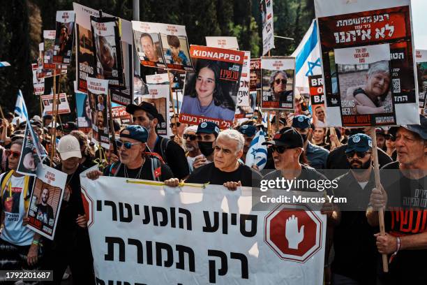 Israeli opposition leader Yair Lapid attend a demonstration with more than a thousand people marching along highway 1 from Tel Aviv to Jerusalem...