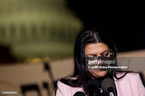 Rep. Rashida Tlaib looks down as she speaks at a news conference to call for a ceasefire in Gaza outside the U.S. Capitol building on November 13,...