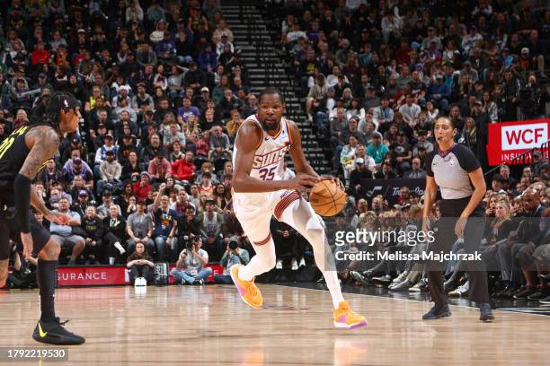Kevin Durant of the Phoenix Suns dribbles the ball during the game against the Utah Jazz on November 19, 2023 at Delta Center in Salt Lake City,...