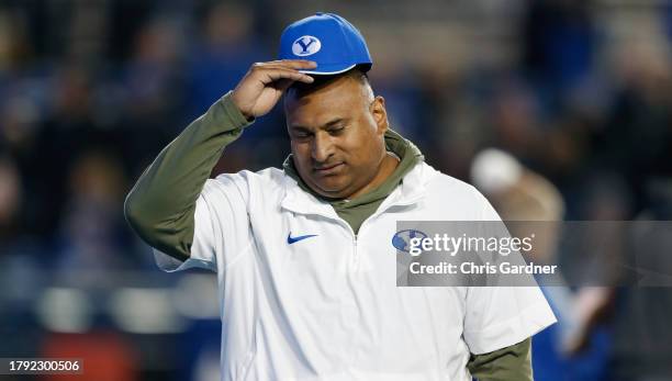 Kalani Sitake head coach of the Brigham Young Cougars walks on the field during warmups before their game against the Iowa State Cyclones at LaVell...