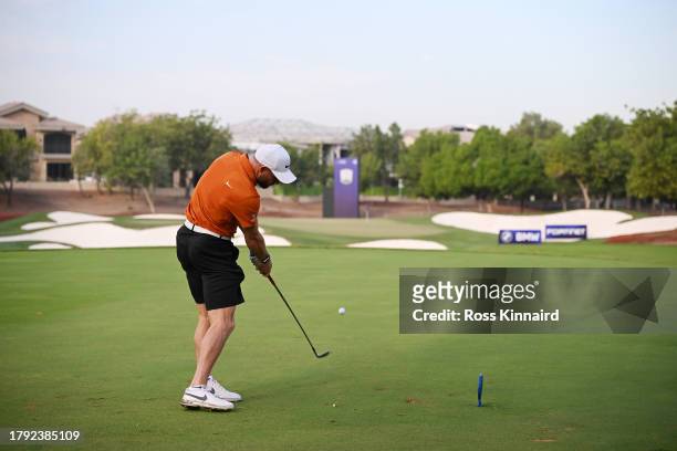 Footballer, James Milner tees off on the fourth hole during the Pro-Am prior to the DP World Tour Championship on the Earth Course at Jumeirah Golf...