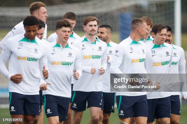 Players jog during a Socceroos training session at Lakeside Stadium on November 14, 2023 in Melbourne, Australia.