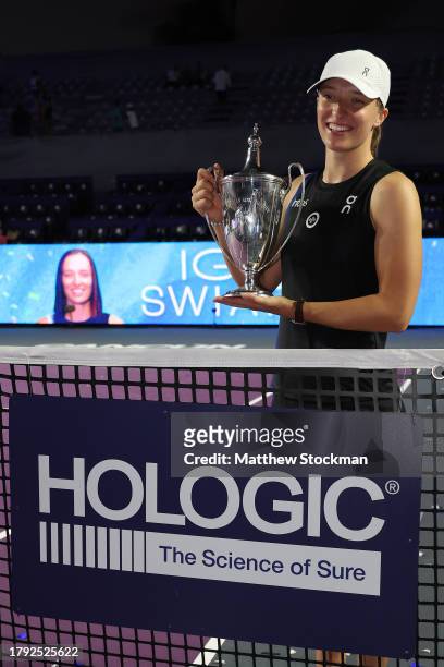 Iga Swiatek of Poland poses at the net after defeating Jessica Pegula of the United States in the singles final on the final day of the GNP Seguros...