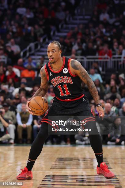 DeMar DeRozan of the Chicago Bulls handles the ball during a game against the Milwaukee Bucks at Fiserv Forum on November 13, 2023 in Milwaukee,...