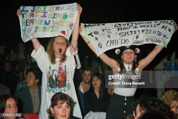 Fans of the English pop group Take That outside Planet Hollywood, London, 23rd July 1993.