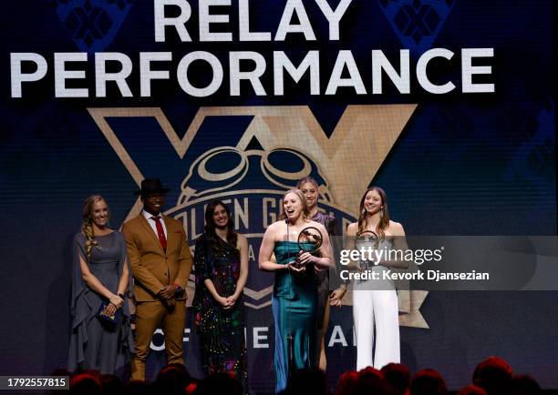 Lilly King, Kate Douglass and Gretchen Walsh Relay Performance of the Year from presenters from left, Dana Vollmer, Cullen Jones, Katie Meili, during...