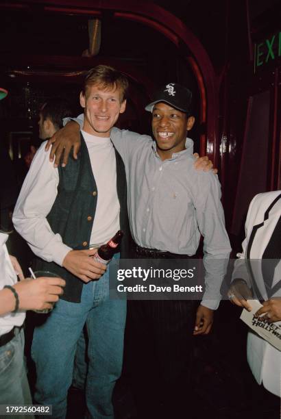 English footballers Teddy Sheringham and Ian Wright at Planet Hollywood, London, 4th August 1993.